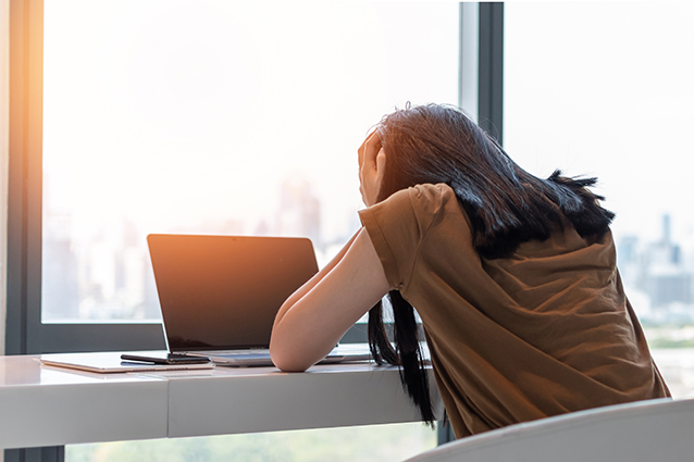 Panic attack woman, stressful depressed emotional person sitting on laptop computer desk.