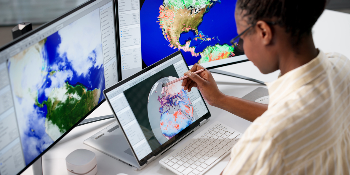 Hardworking Meteorologist Analyzing Climate Change Data On Desktop Computer